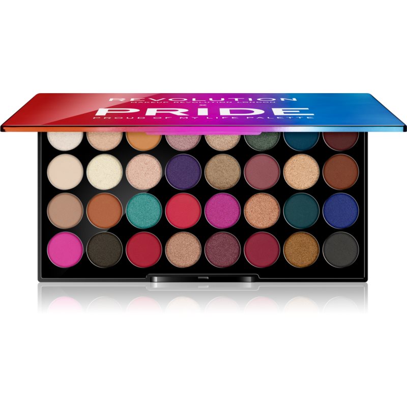 Colorful eye shadow palette featuring 40 vibrant shades, including matte and shimmer finishes, with a rainbow gradient lid reading "Revolution Pride" and "Proud of My Life."