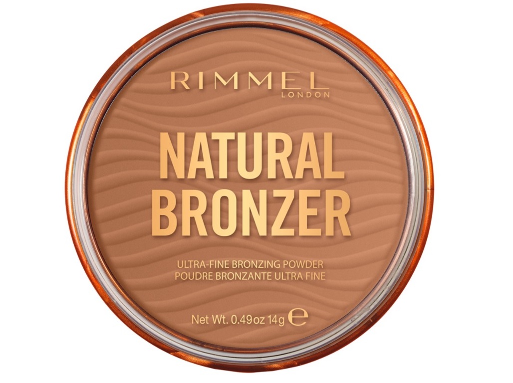 Round compact featuring a warm, sandy-brown bronzing powder with a wavy texture, labeled "NATURAL BRONZER" in bold gold letters, with an orange metallic rim.