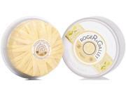 Round, pale yellow soap with a textured surface, featuring a circular label with "Roger & Gallet" and a lemon motif, packaged in a white box.