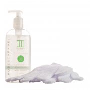 Clear bottle with a pump dispenser labeled "Debenhams Purity Fade Away Self Tan Removing Shower Gel 200ml" alongside two textured white exfoliating gloves.
