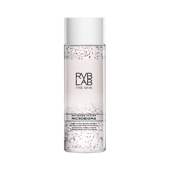 Clear bottle containing a pinkish liquid with visible red particles, labeled "Idra Tonico Riequilibrante 200 Ml" by RVB Lab, featuring a sleek, modern design.