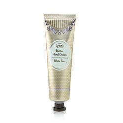 75ml tube of Sabon White Tea Hand Cream featuring a cream-colored design with polka dots, elegant silver accents, and a decorative cap.