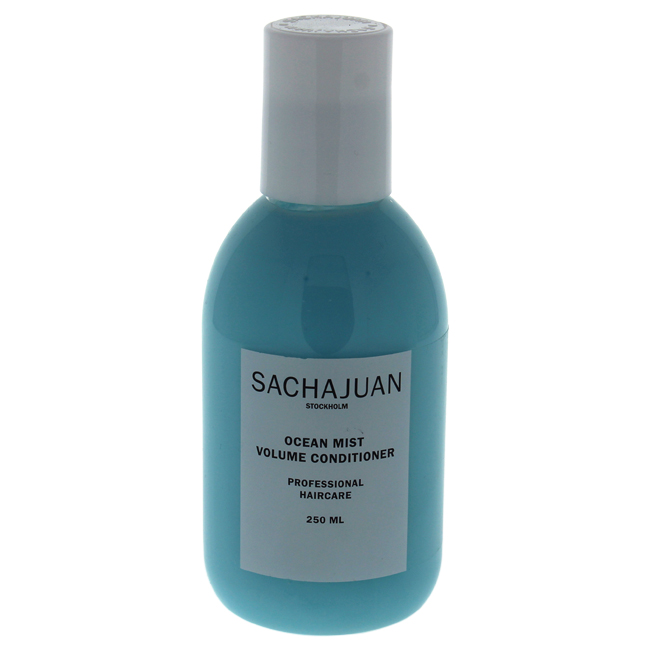Turquoise bottle of Sachajuan Ocean Mist Volume Conditioner with a white cap, featuring a minimalist label that states "SACHAJUAN," "OCEAN MIST VOLUME CONDITIONER," and "250 ML."