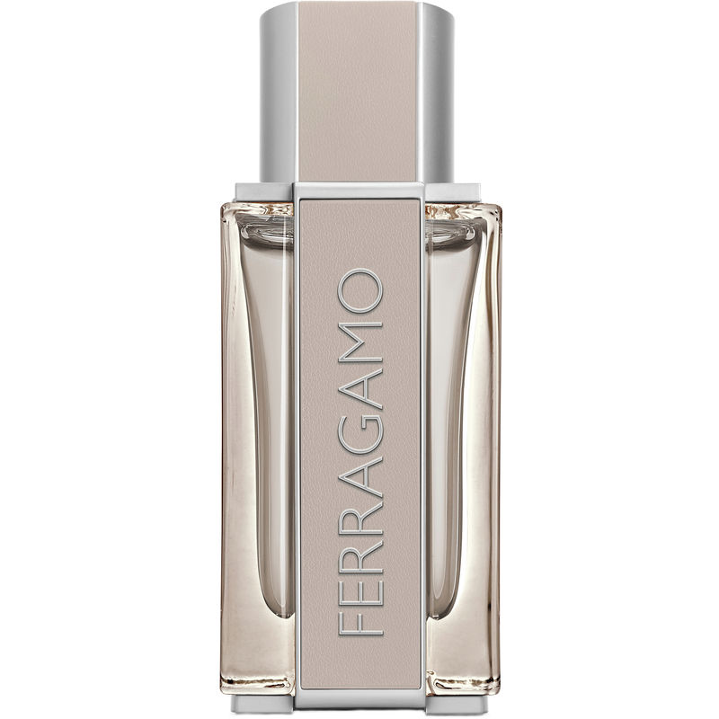 Clear glass bottle of Ferragamo Bright Leather Eau De Toilette featuring a sleek design, a light beige cap, and embossed silver branding on the front.