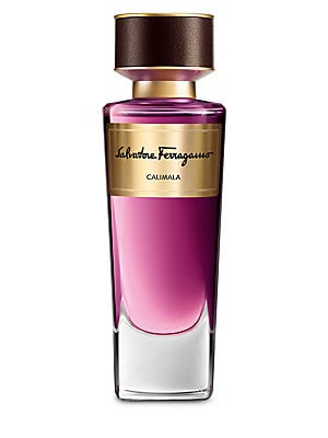 Clear glass bottle with a sleek design, featuring a gradient of pink to purple, topped with a brown cap and gold accents, labeled "Salvatore Ferragamo Calimala."