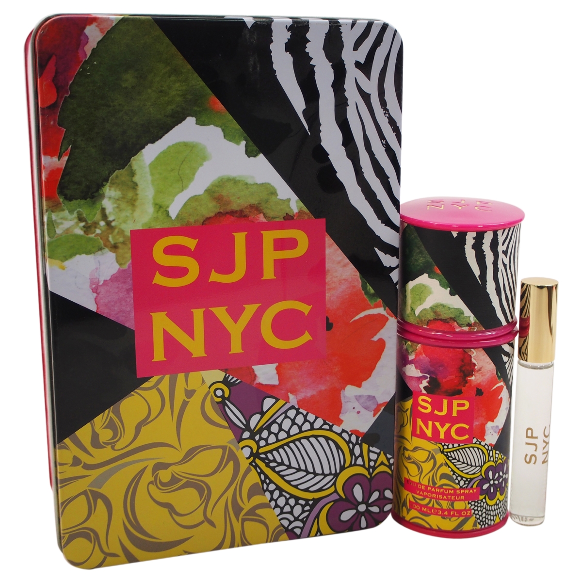Colorful gift set featuring a floral and zebra print tin, a vibrant pink bottle of perfume, and a small rollerball, all labeled "SJP NYC."