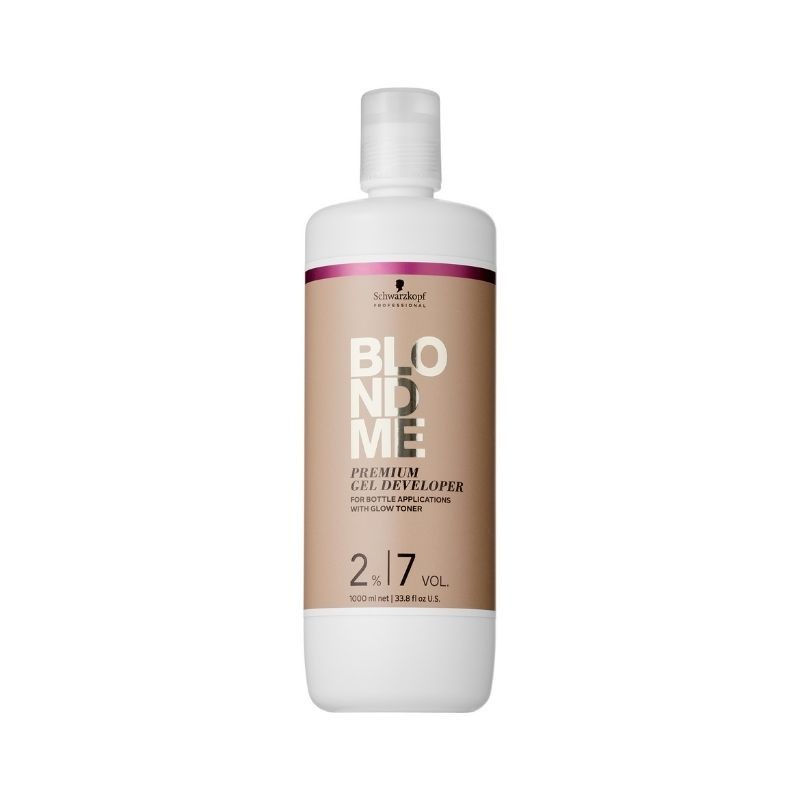 White plastic bottle with a pump top, featuring a beige label that reads "BLONDME" and "Premium Gel Developer" in bold letters, with a 2% volume indicator and 1000 ml capacity.