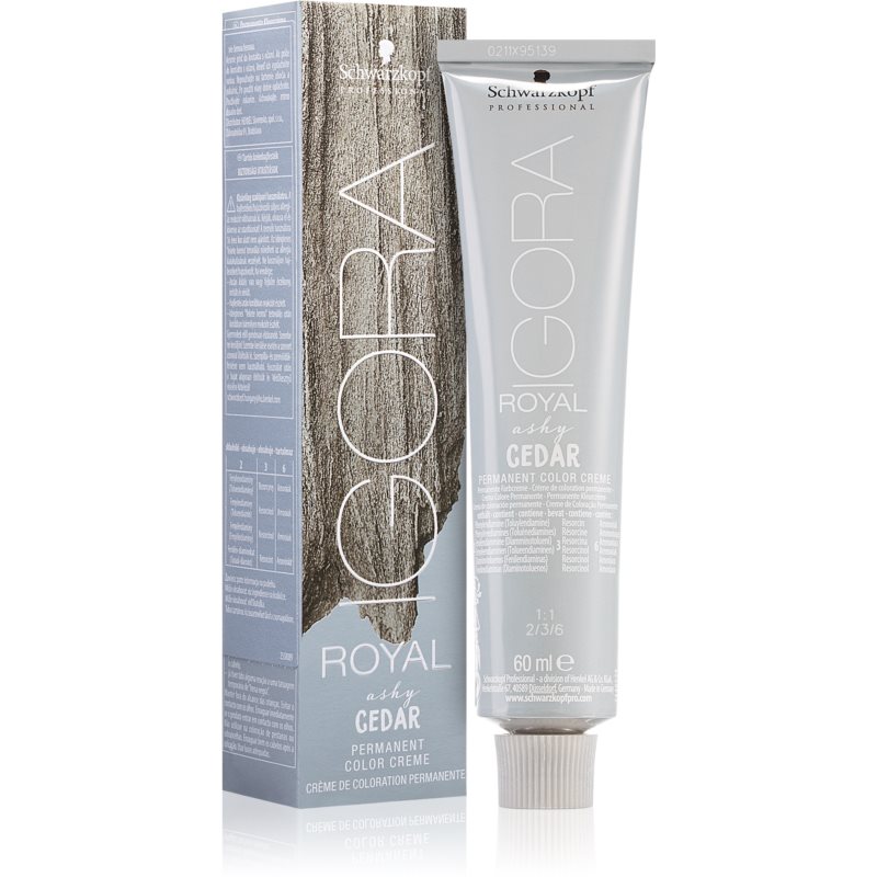 Light ash brown permanent hair color in a 60 ml silver tube, featuring a sleek design with a gray and wood-themed box, labeled "Igora Royal" by Schwarzkopf Professional.