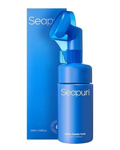 Bright blue bottle of Seapuri Scalpy Bubble Tonic, 100ml, with a spray nozzle, next to a matching blue box featuring the brand name prominently.