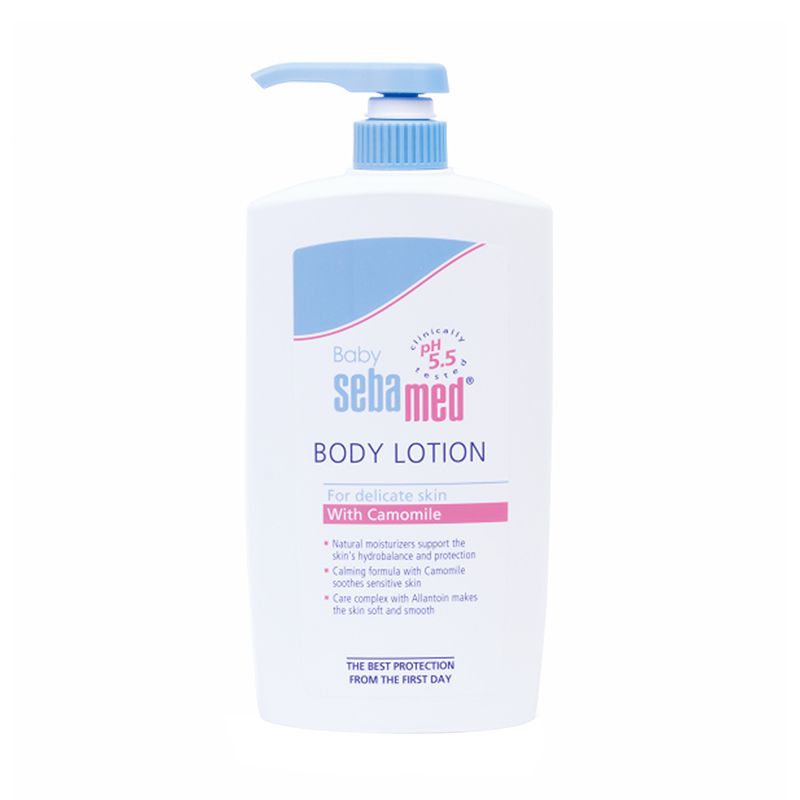 White plastic bottle of Sebamed Baby Lotion, 750ml, featuring a blue pump top, with a label highlighting pH 5.5 and chamomile for delicate skin care.