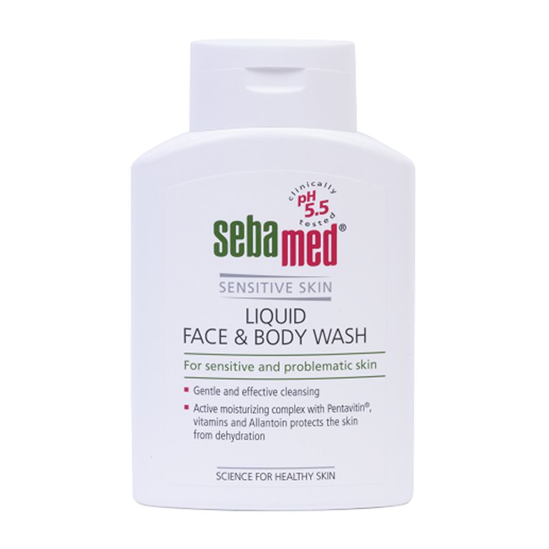 White plastic bottle of Sebamed Liquid Face & Body Wash, 200ml, featuring a red and green logo, with a flip-top cap and text highlighting pH 5.5 for sensitive skin.