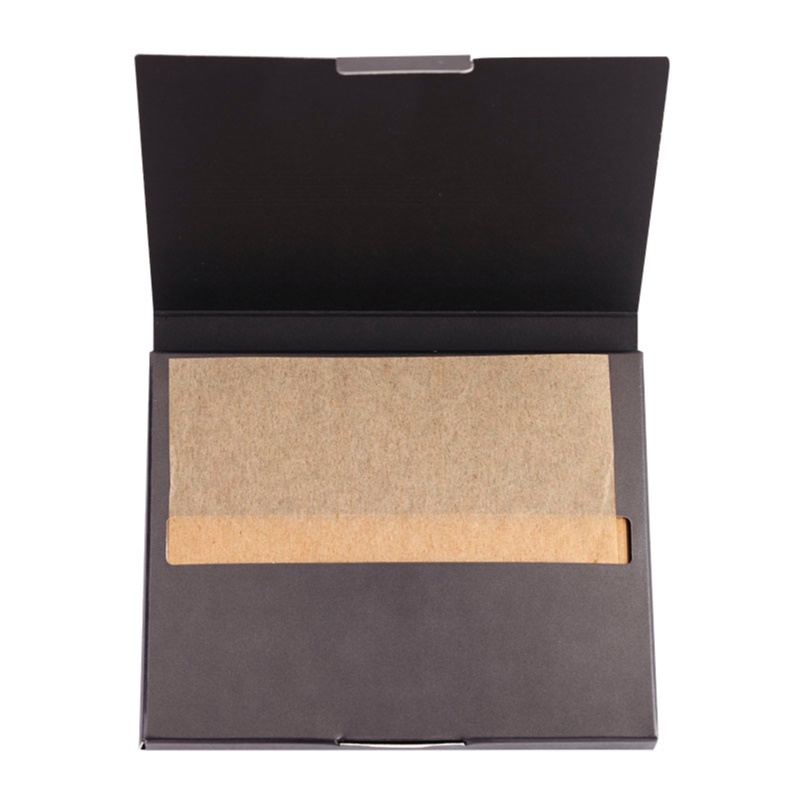 Black rectangular box containing 100 sheets of beige matting paper, designed for absorbing excess oil and providing a fresh skin finish.
