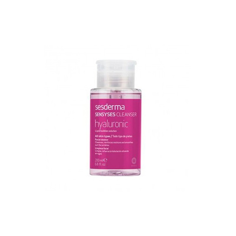 Clear plastic bottle with a pink label, featuring "Sesderma" and "Sensyses Hyaluronic Acid Cleansing Makeup Remover" text, containing 200 ml of liquid.