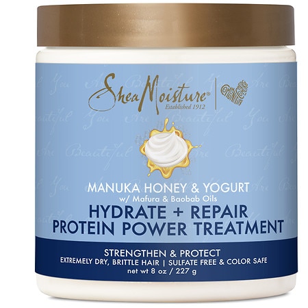 White jar with a light blue label featuring the SheaMoisture logo, product name in bold, and a graphic of honey; designed for hydrating and repairing hair.