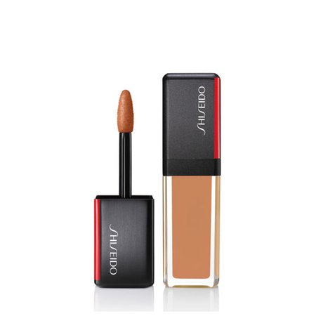 Shiseido Lacquerink in shade 310 - Honey Flash features a sleek black and gold tube with a doe-foot applicator, showcasing a warm honey-toned liquid lipstick.