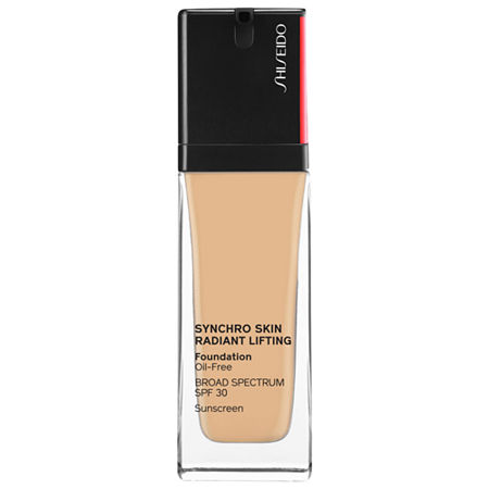 Shiseido Synchro Skin Radiant Lifting Foundation in Nude, featuring a sleek glass bottle with a black pump top and red accent, labeled with product details and SPF 30.