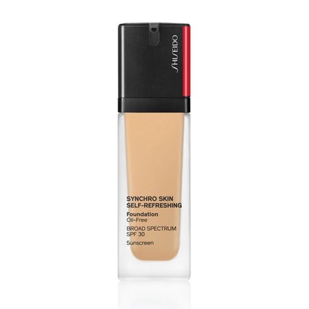 Shiseido Synchro Skin Self-Refreshing Foundation in a clear glass bottle with a black pump top, featuring a label with bold black text and a red accent.