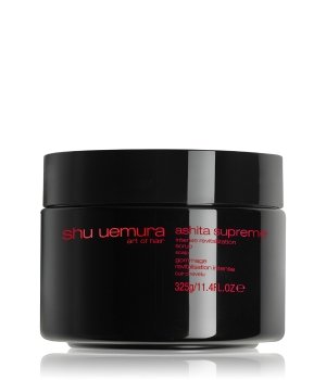 Black jar with a glossy finish, featuring red text that reads "Shu Uemura Ashita Supreme," containing 325g of hair treatment.