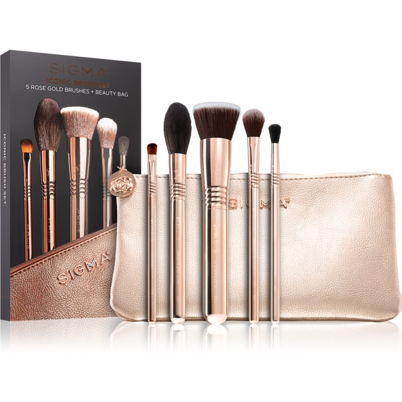Five rose gold makeup brushes with soft bristles, displayed alongside a matching rose gold beauty bag, all packaged in a sleek box featuring the Sigma Beauty logo.