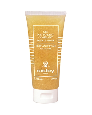 Transparent tube containing a golden gel, labeled "Buff & Wash Facial Gel" by Sisley, featuring white text and a simple design, with a capacity of 100ml/3.3oz.
