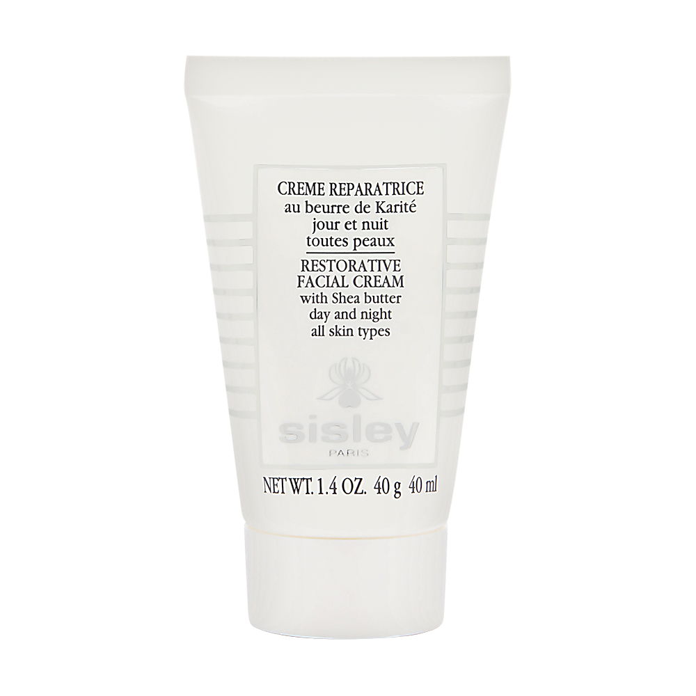 White tube of Sisley Restorative Facial Cream with Shea Butter, featuring black text and a sleek design, labeled for day and night use for all skin types, 40ml.