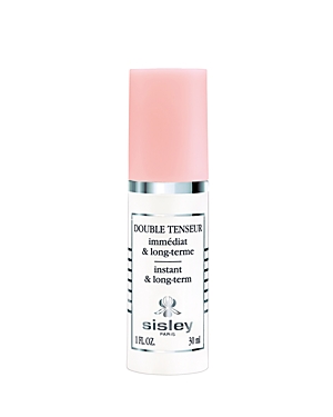 Clear serum bottle with a sleek white body, silver accents, and a soft pink cap, labeled "Sisley Double Tenseur" in elegant black font, 30 ml size.