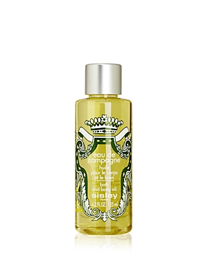 Beige bottle of Sisley Eau De Campagne Bath Oil, featuring intricate green floral designs and a silver cap, contains 125ml of product.