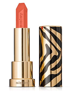 Sisley Le Phyto Rouge lipstick in #30 Orange Ibiza, featuring a vibrant orange bullet and a stylish gold and black zebra-striped case.