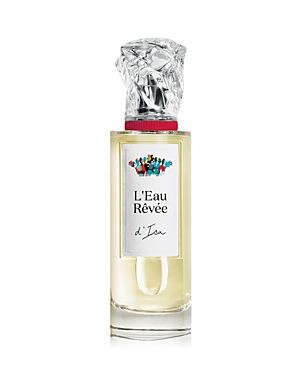 Clear glass bottle with a crystal-like cap, featuring a white label with colorful artwork and the text "L'Eau Rêvée d'Isa" in elegant font, containing 3.3 oz of fragrance.