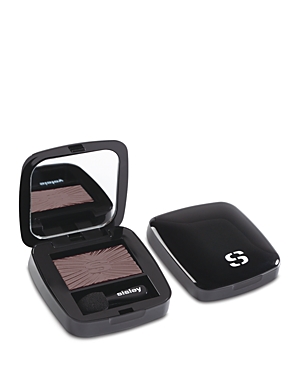 Black compact with a mirror, featuring a deep brown eyeshadow with a textured surface and a small applicator, branded with the Sisley logo on the lid.