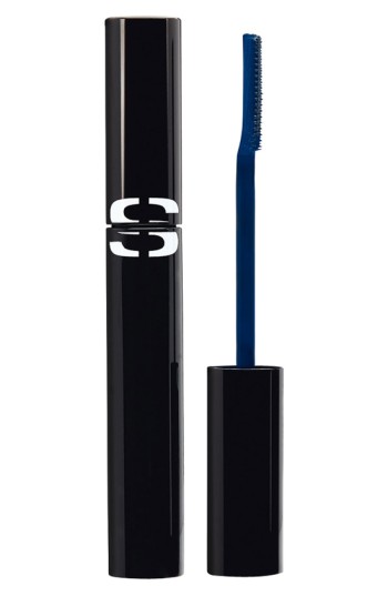 Black cylindrical mascara tube with a white "S" logo, featuring a blue applicator brush with fine bristles for precise application.