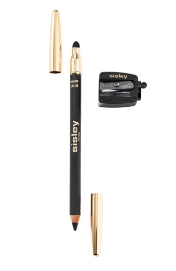 Purple eyeliner pencil with a gold cap, accompanied by a black blending tip and a sharpener, all featuring the Sisley logo.