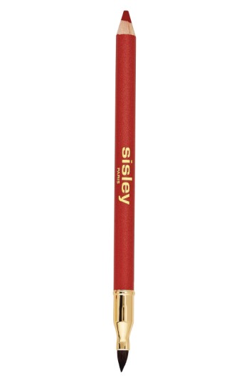 Red lip pencil with a wooden body, featuring a gold logo and a dual-ended design that includes a brush tip for blending.