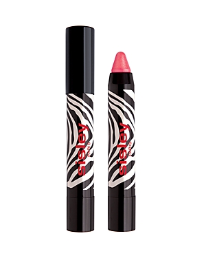 Sisley Paris Phyto-Lip Twist features a pink lip crayon with a twist-up mechanism, encased in a black tube adorned with a bold zebra print and red branding.