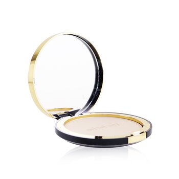 Compact powder in a sleek black case with gold accents, featuring a mirror inside and a smooth, light beige powder.