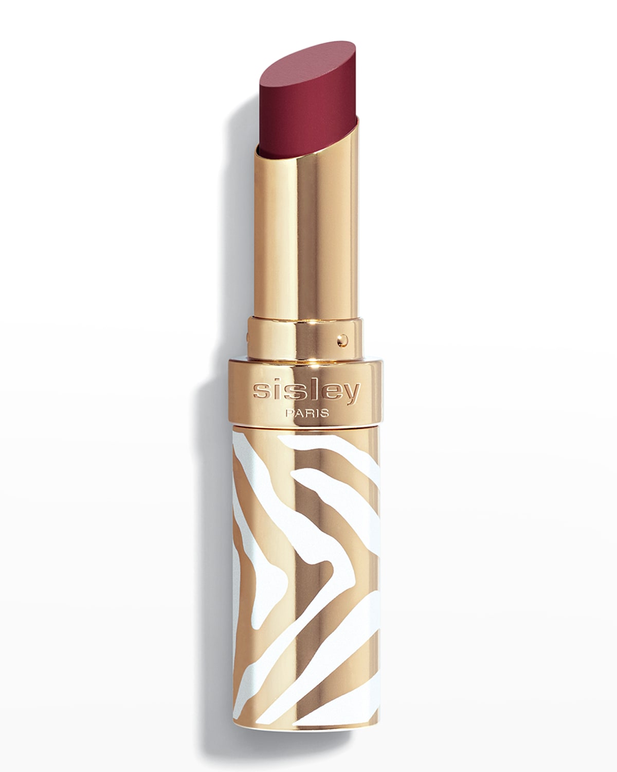Sisley Phyto-rouge Lip Shine in 31 Sheer Chili, featuring a deep red lipstick bullet housed in a gold and white zebra-patterned case.
