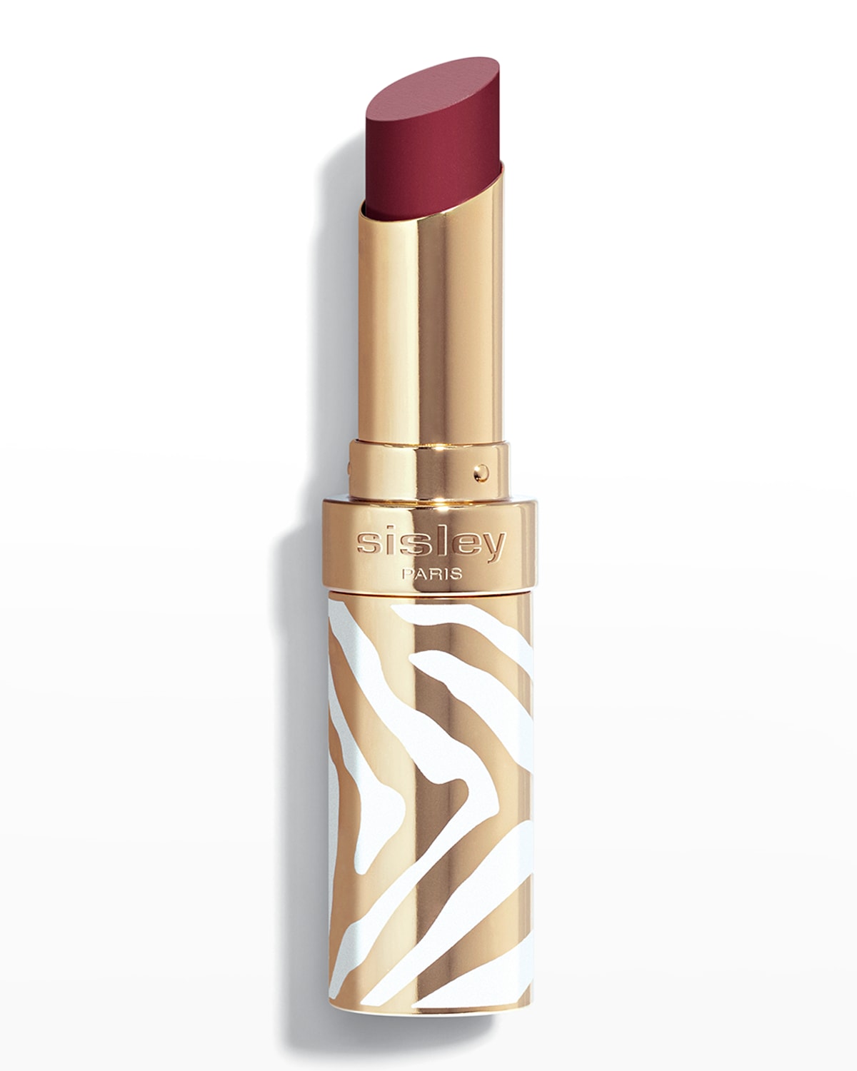 Sisley-Paris Phyto-Rouge Shine lipstick in a deep burgundy shade, housed in a gold and white zebra-striped tube with a shiny finish.