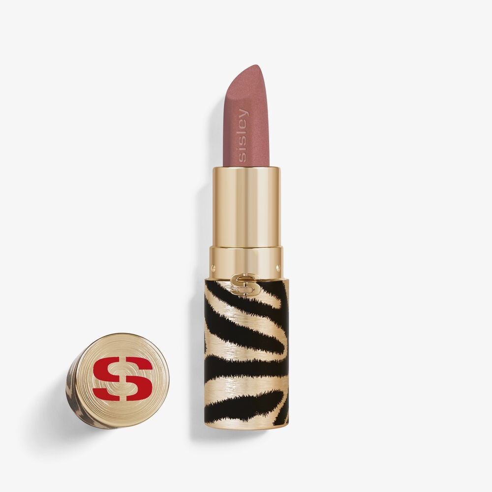 Sisley Paris Phyto-Rouge Velvet lipstick in a soft mauve shade, housed in a luxurious gold and black zebra-striped case with a red logo.