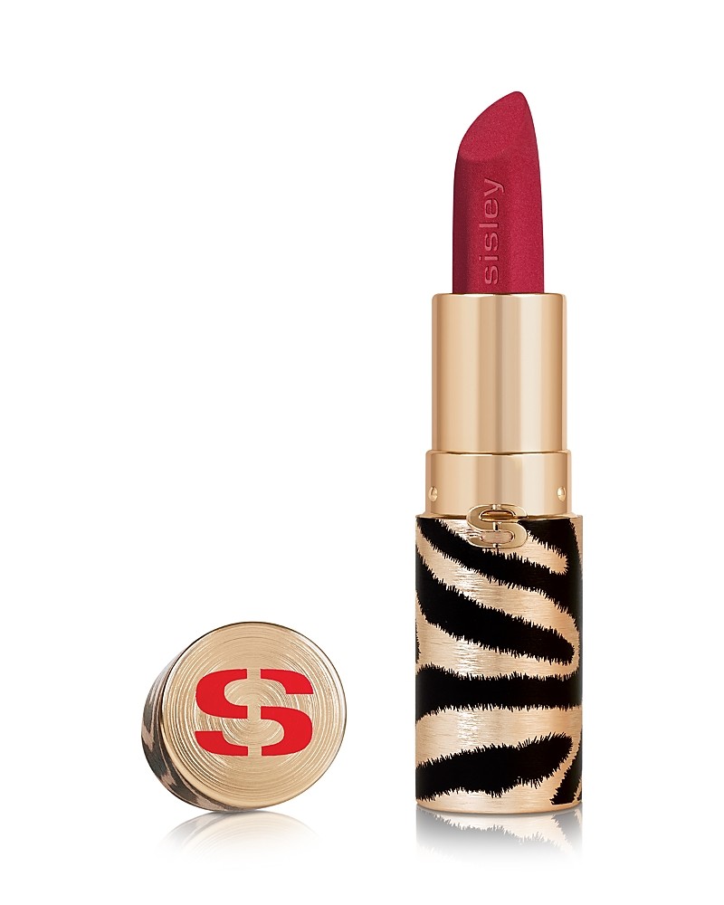 Red velvet lipstick in a gold and black zebra-patterned case, featuring the Sisley logo on the bullet and cap, showcasing a luxurious design.