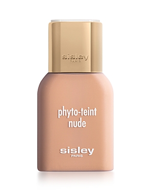 Light beige foundation bottle with a gold cap, labeled "phyto-teint nude" and "sisley paris," showcasing a sleek, modern design for a water-infused second skin effect.