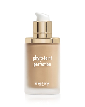 Glass bottle with a frosted finish, featuring a gold pump top and a white label that reads "phyto-teint perfection" and "sisley paris," in a warm beige shade.