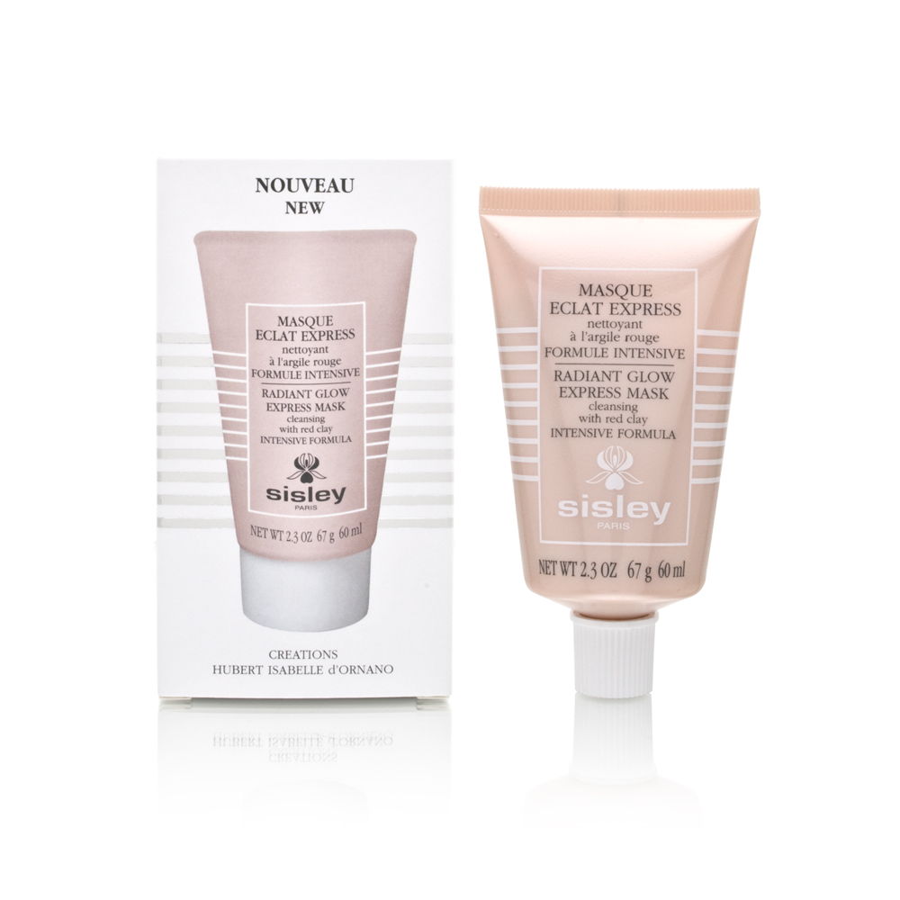 Radiant Glow Express Mask in a soft pink tube, featuring a white box with "NOUVEAU" and "Sisley" branding, highlighting its red clay intensive formula for cleansing.