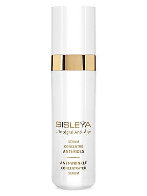 White cylindrical bottle with a gold band and text detailing, featuring "Sisley-Paris Sisleya L'Integral Anti-Age Anti-Wrinkle Concentrated Serum" prominently displayed.