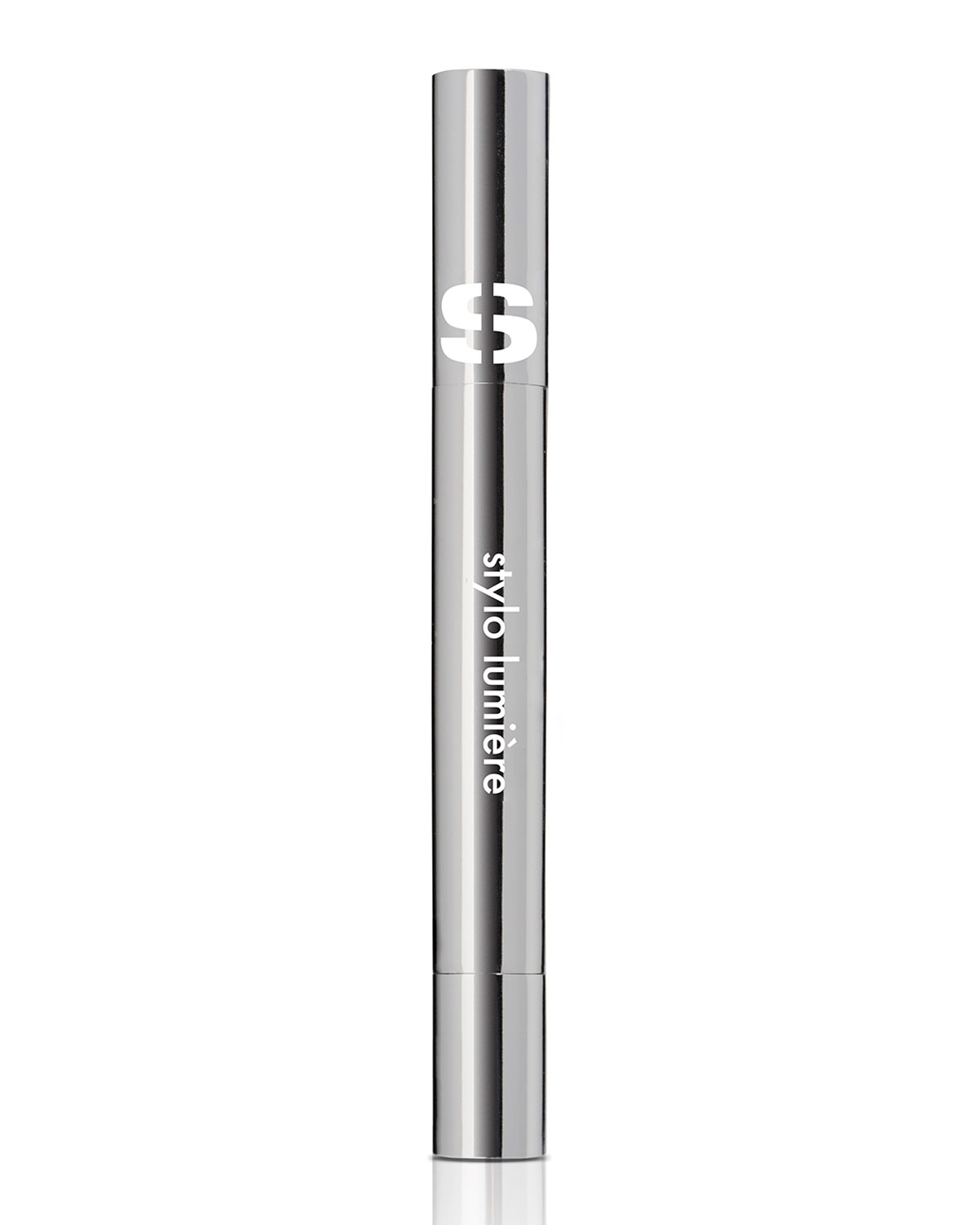Silver highlighter pen with a sleek, metallic finish, featuring the brand name "Sisley" and "stylo lumière" in white text, designed for instant radiance boosting.