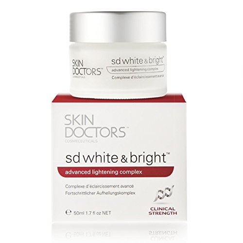 White cream jar with a silver lid, labeled "Skin Doctors SD White & Bright," accompanied by a red and white box, highlighting "advanced lightening complex" in bold text.