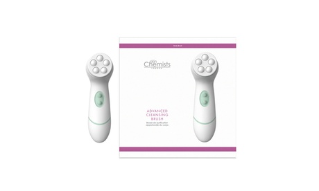 White advanced facial and body cleansing brush with four interchangeable heads, featuring a green accent button and packaged in a purple and white box labeled "skinChemists."