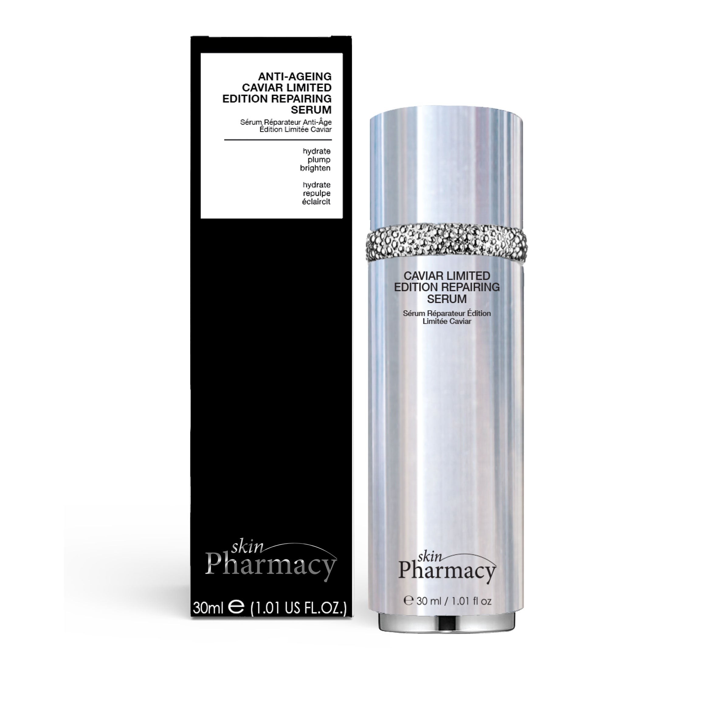 Silver cylindrical serum bottle with a textured silver band, labeled "Caviar Limited Edition Repairing Serum," alongside a sleek black box featuring product details.