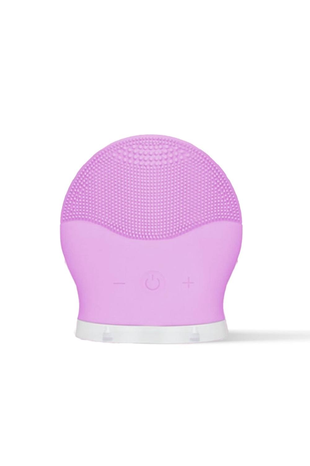 Purple silicone facial cleansing device with textured surface, featuring a power button and volume controls, set against a white background.