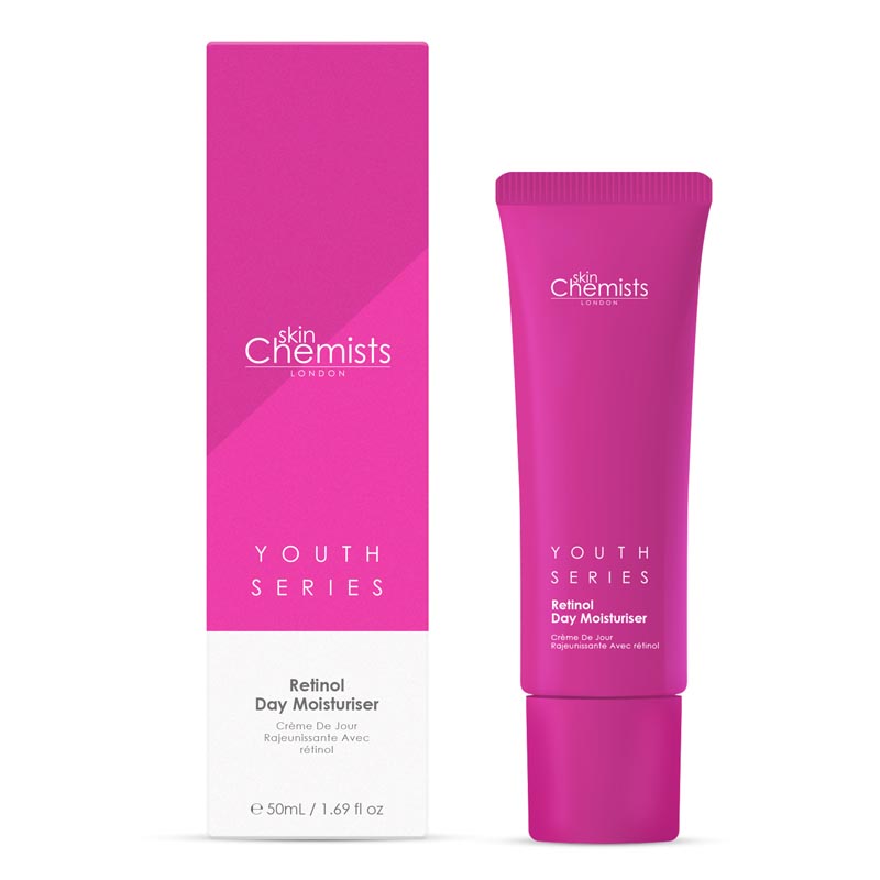 Bright pink tube of SkinChemists Retinol & Bakuchiol Day Moisturizer, 50ml, with a sleek design, featuring "Youth Series" and product details on the box and tube.
