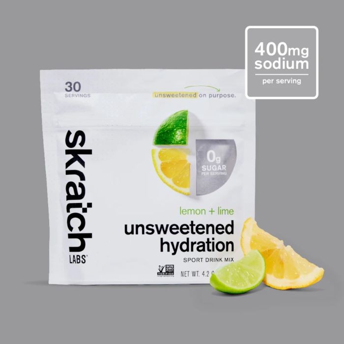 Skratch Labs unsweetened hydration sport drink mix in a white pouch, featuring a lemon and lime graphic, with 30 servings and 0g sugar highlighted on the packaging.
